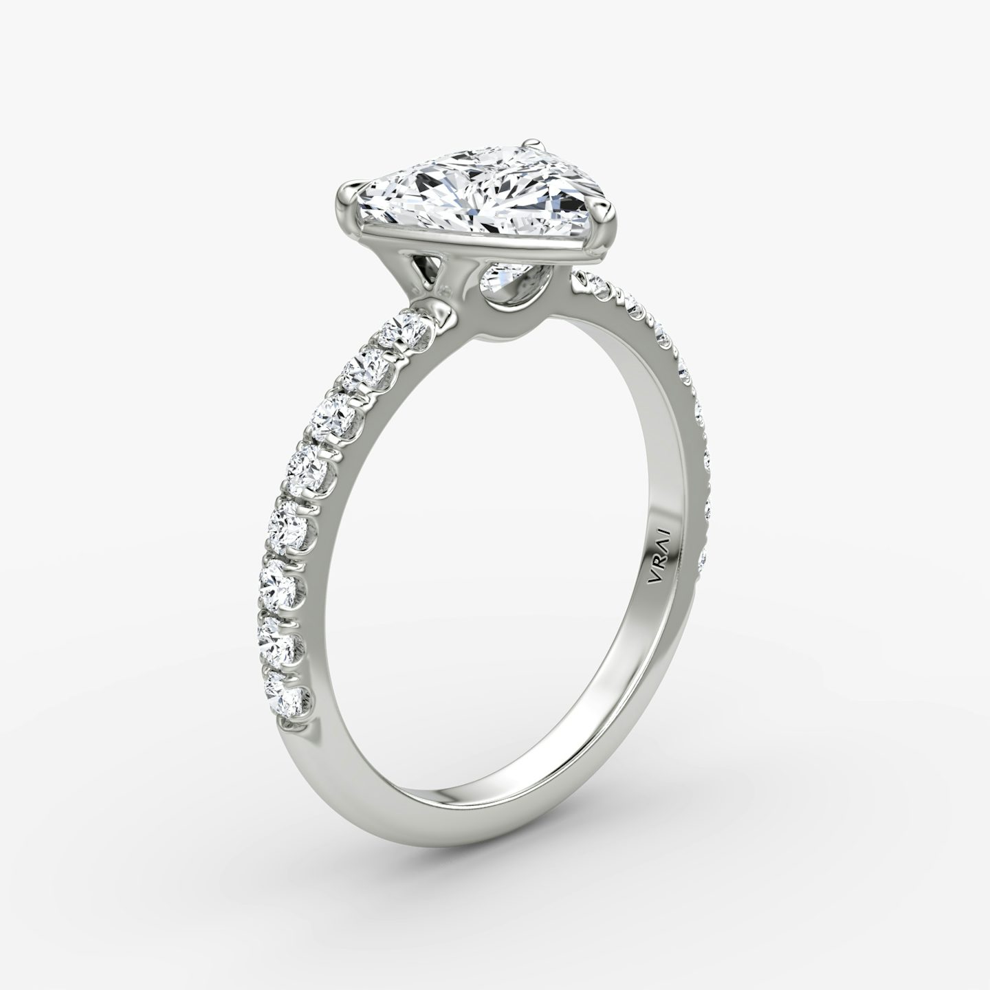 The Signature | Trillion | 18k | 18k White Gold | Band width: Large | Band: Pavé | Setting style: Plain | Diamond orientation: vertical | Carat weight: See full inventory