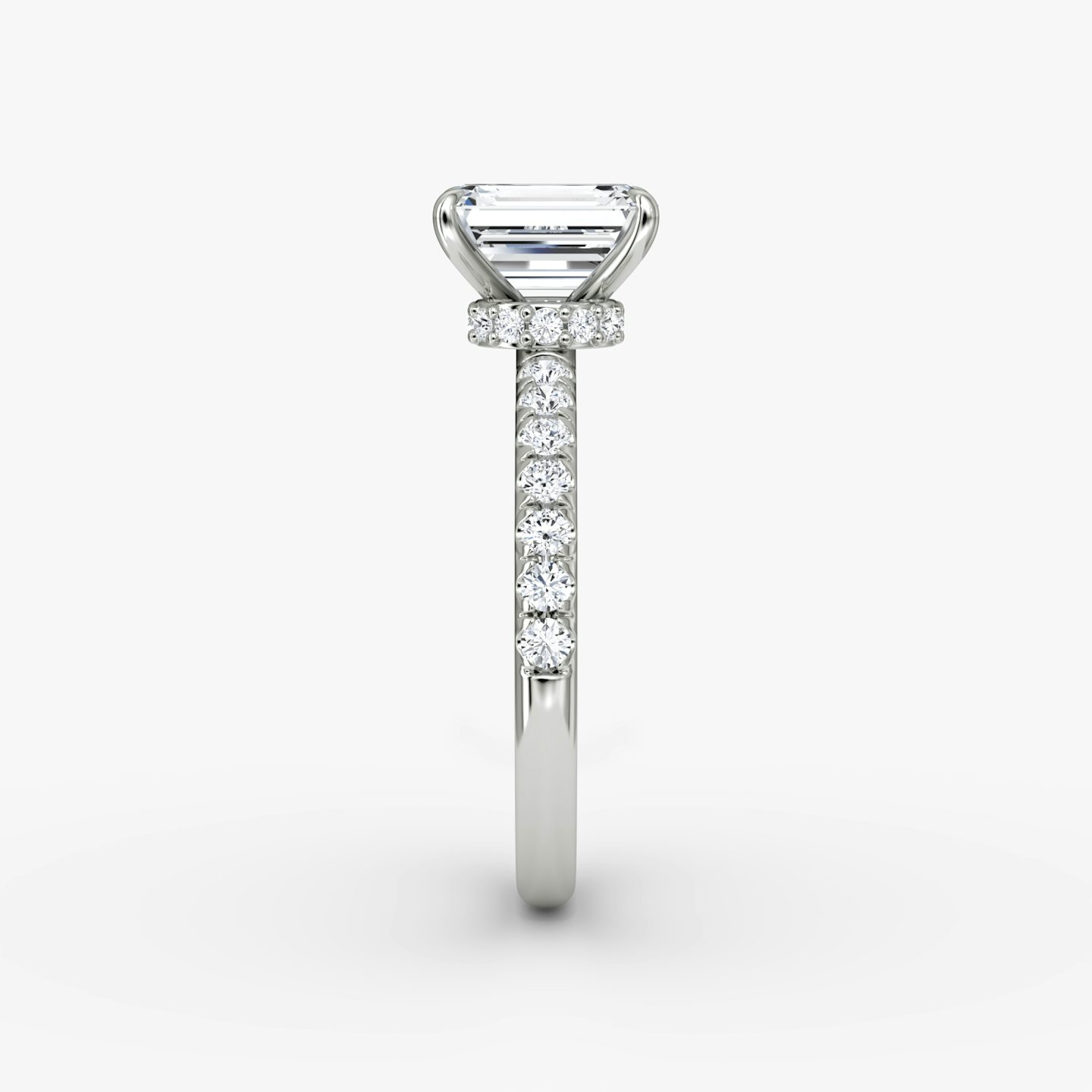 The Veiled Halo | Emerald | Platinum | Band: Pavé | Diamond orientation: vertical | Carat weight: See full inventory