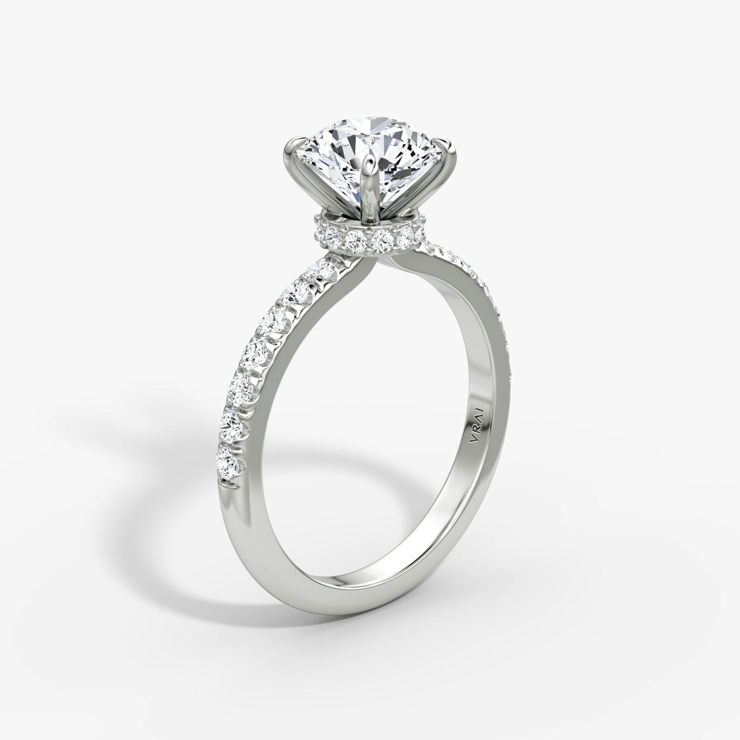 The Veiled Halo | Round Brilliant | Platinum | Band: Pavé | Carat weight: See full inventory | Diamond orientation: vertical