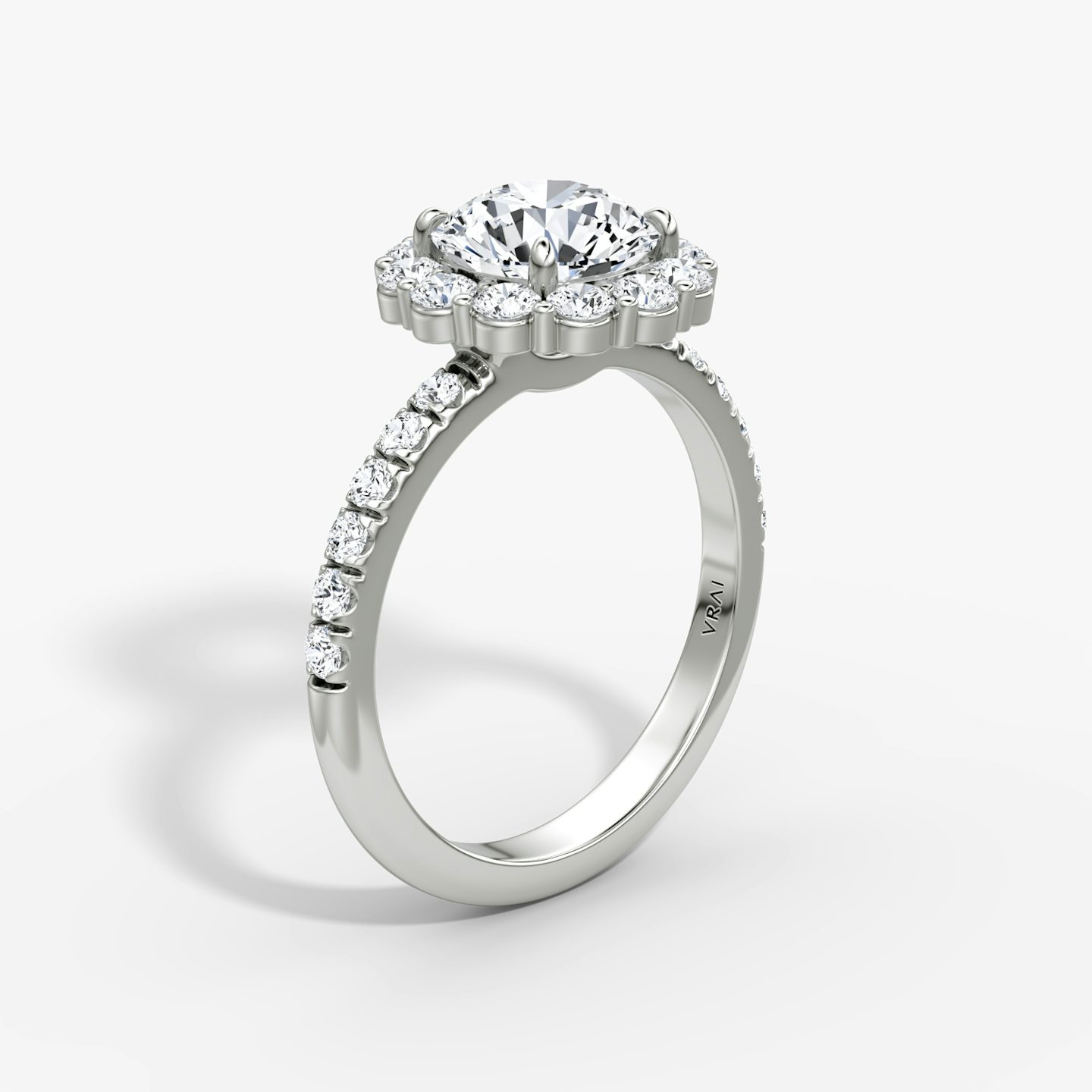 The Signature Floral Halo | Round Brilliant | Platinum | Band: Pavé | Carat weight: See full inventory | Diamond orientation: vertical