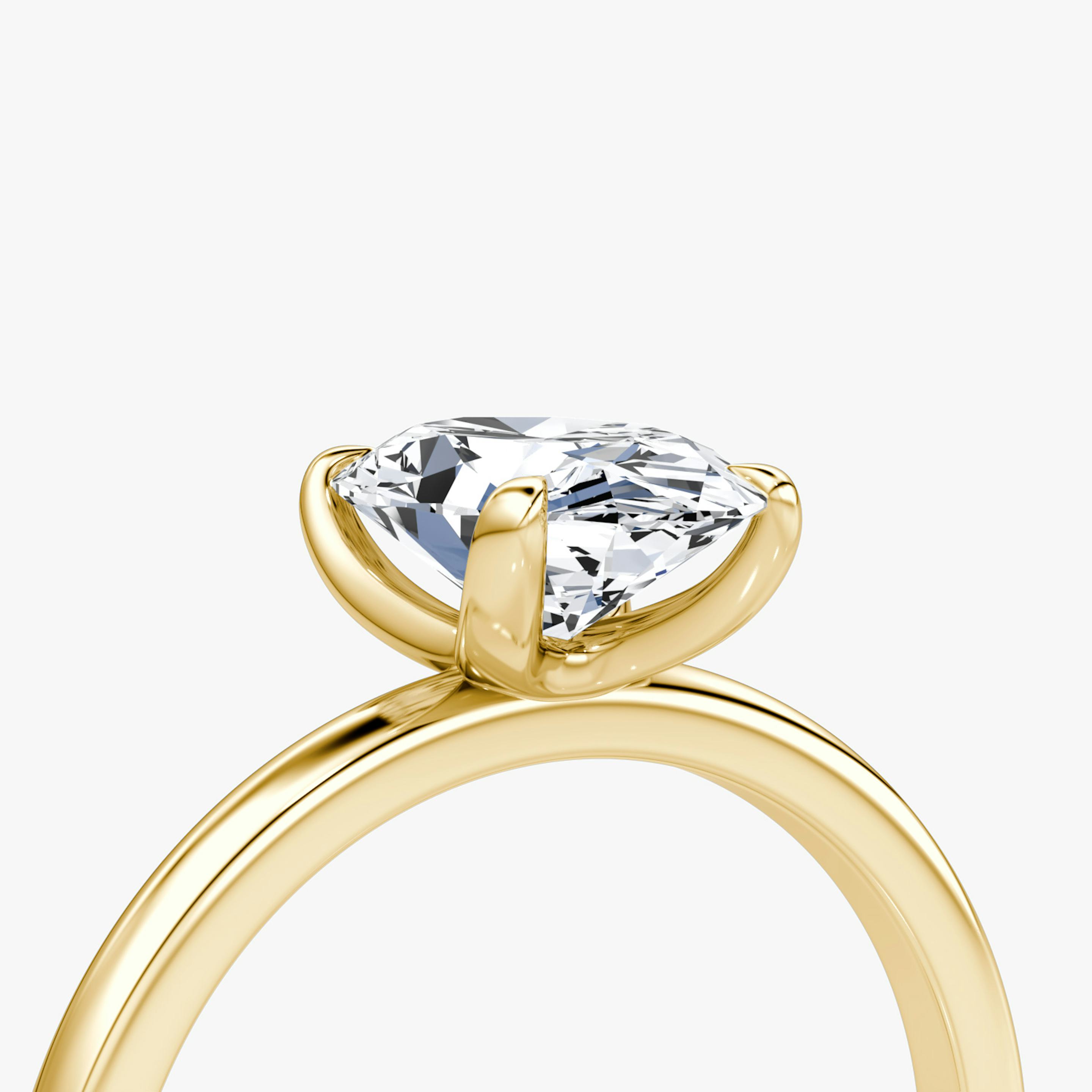 The Classic | Oval | 18k | 18k Yellow Gold | Band width: Standard | Band: Plain | Diamond orientation: vertical | Carat weight: See full inventory