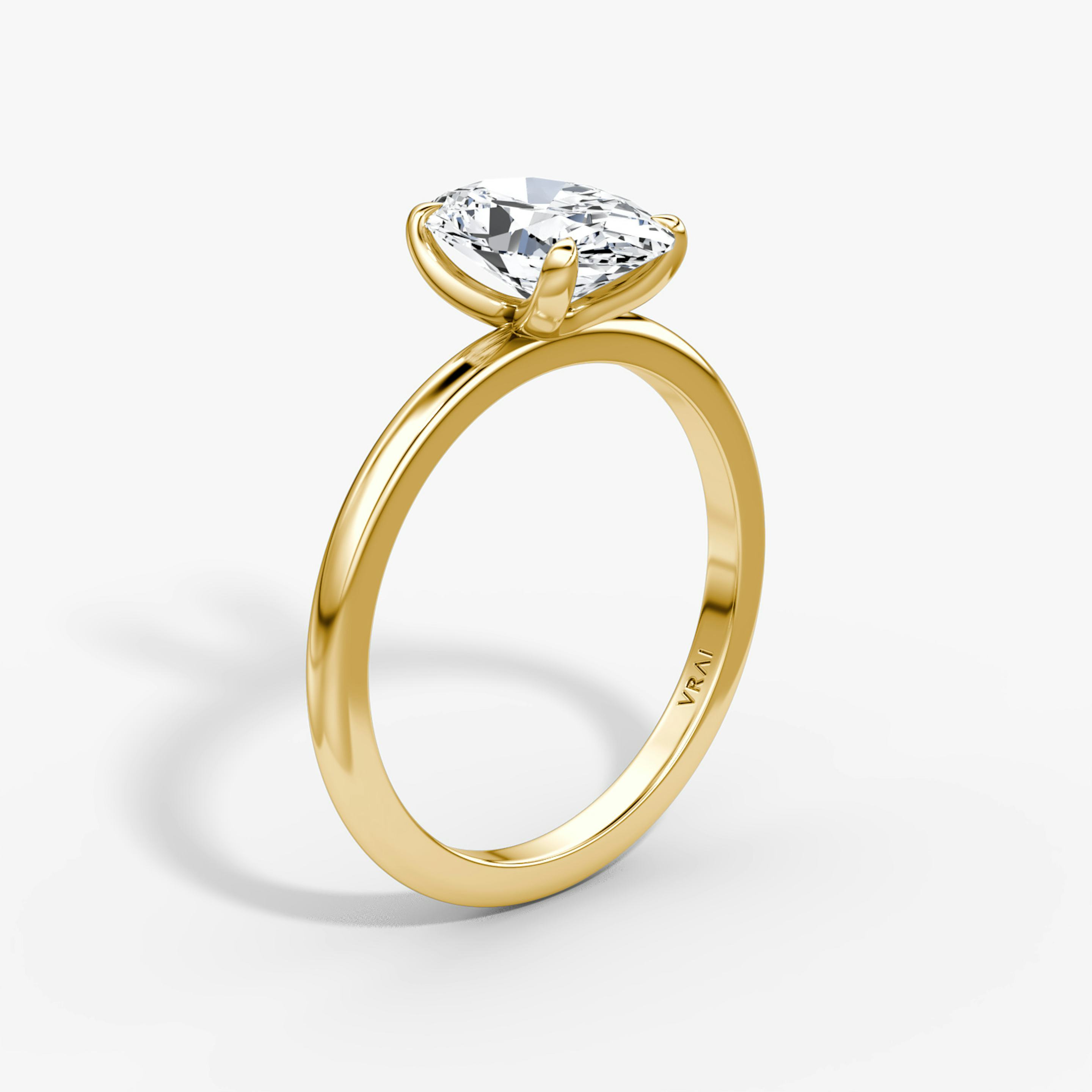 The Classic | Oval | 18k | 18k Yellow Gold | Band width: Standard | Band: Plain | Diamond orientation: vertical | Carat weight: See full inventory