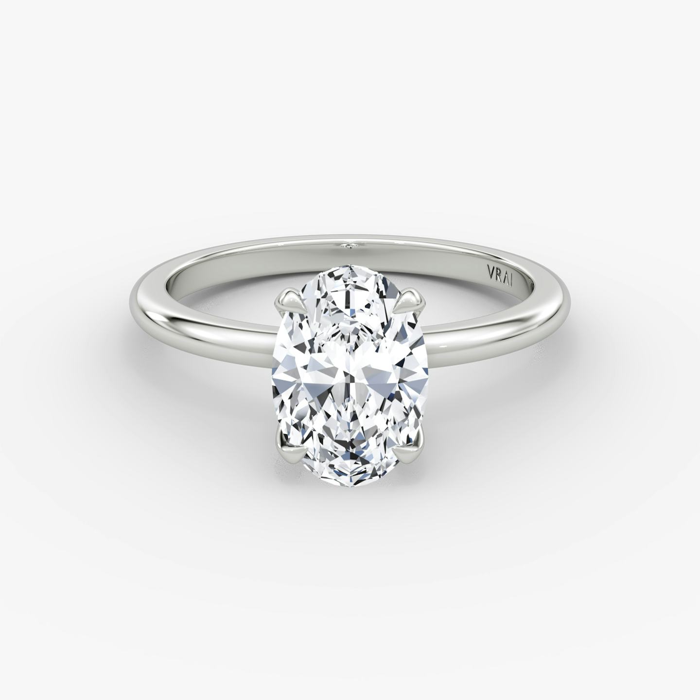 The Classic | Oval | 18k | 18k White Gold | Band width: Standard | Band: Plain | Diamond orientation: vertical | Carat weight: See full inventory