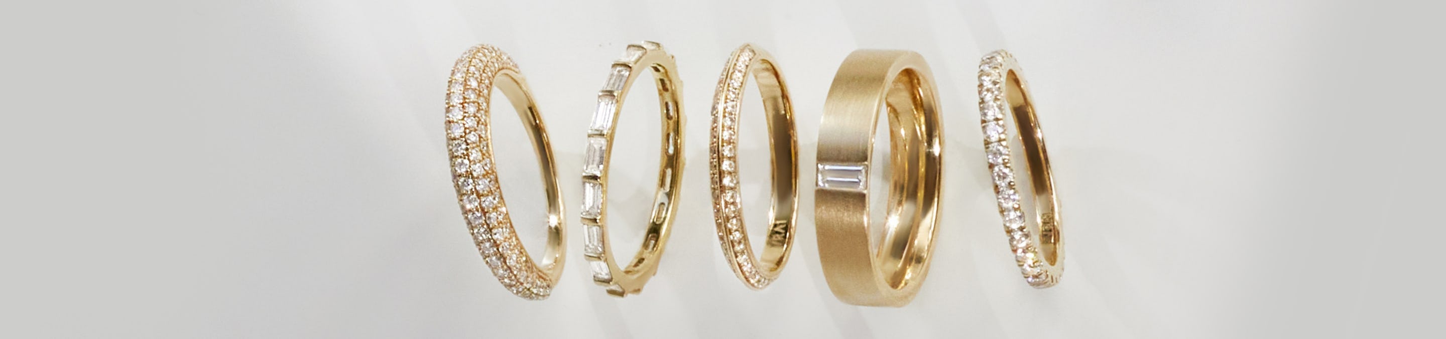 Five different types of rings including pave ring, signet ring and more