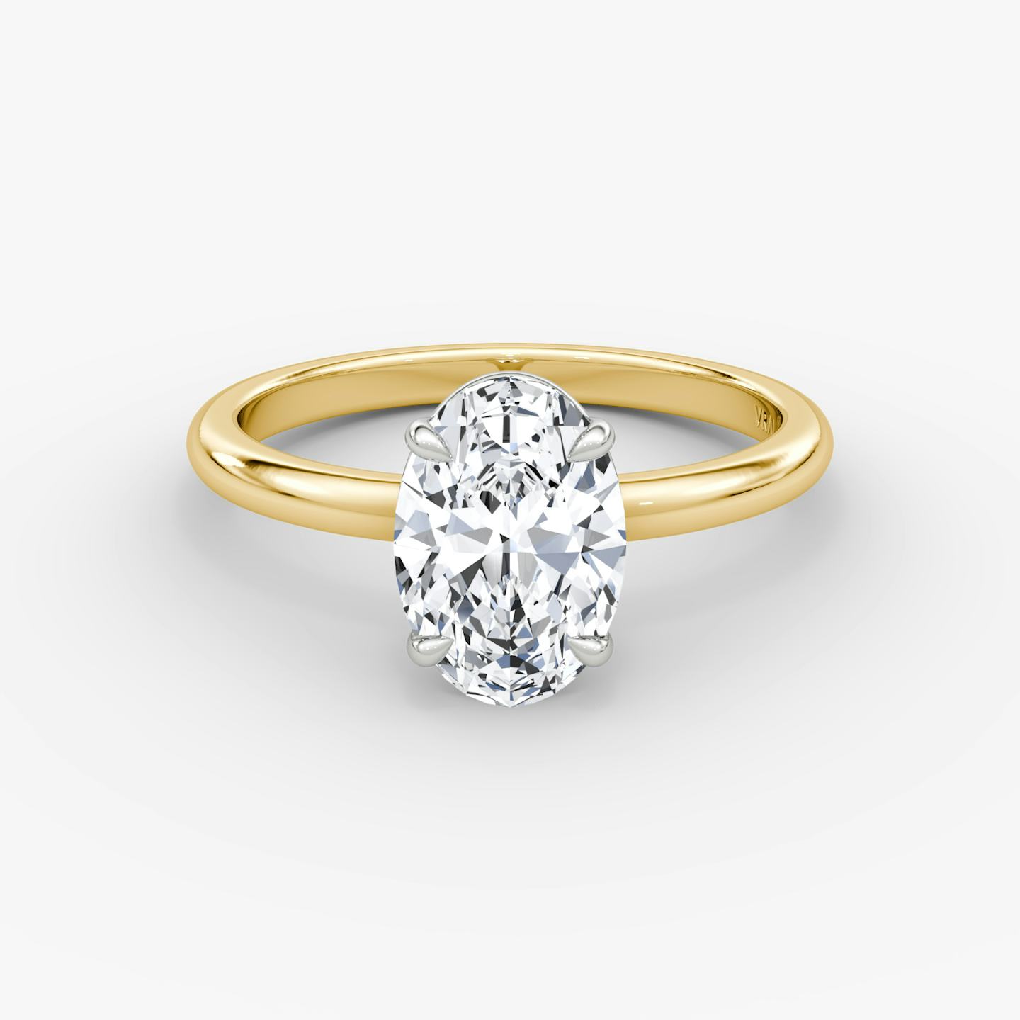 The Signature | Oval | 18k | 18k Yellow Gold and Platinum | Band width: Standard | Band: Plain | Setting style: Plain | Diamond orientation: vertical | Carat weight: See full inventory