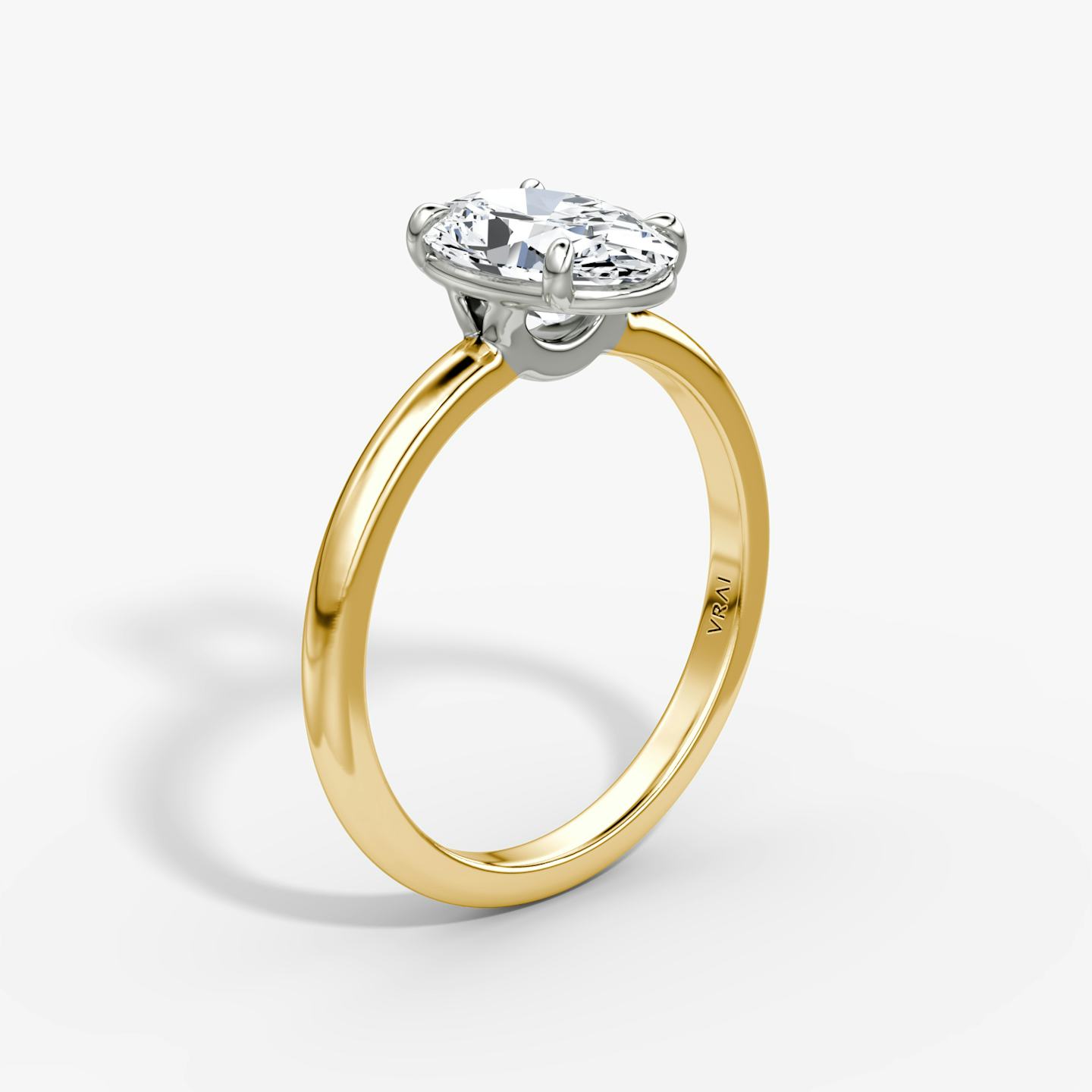 The Signature | Oval | 18k | 18k Yellow Gold and Platinum | Band width: Standard | Band: Plain | Setting style: Plain | Diamond orientation: vertical | Carat weight: See full inventory