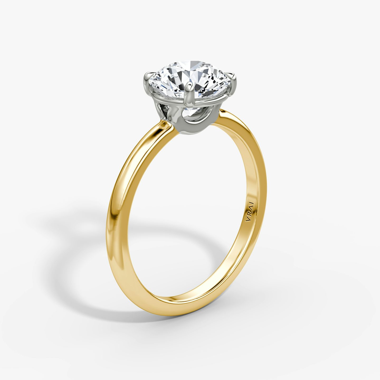 The Signature | Round Brilliant | 18k | 18k Yellow Gold and Platinum | Band width: Standard | Band: Plain | Setting style: Plain | Carat weight: See full inventory | Diamond orientation: Horizontal