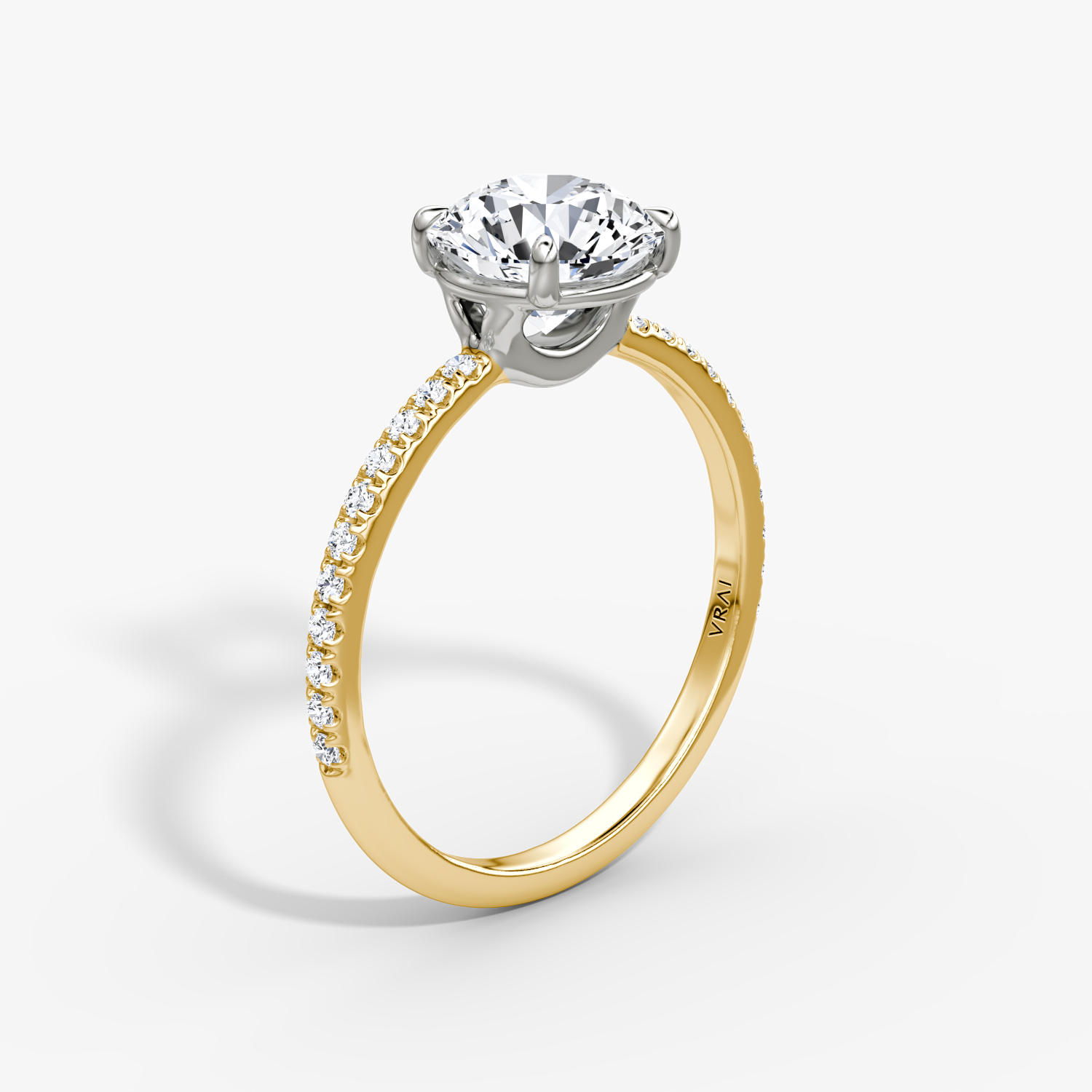 Signature Round Brilliant Engagement Ring | 18k Yellow Gold and Platinum