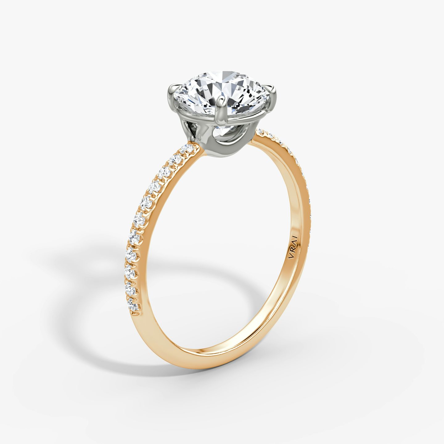 The Signature | Round Brilliant | 14k | 14k Rose Gold and Platinum | Band width: Standard | Band: Pavé | Setting style: Plain | Carat weight: See full inventory | Diamond orientation: Horizontal