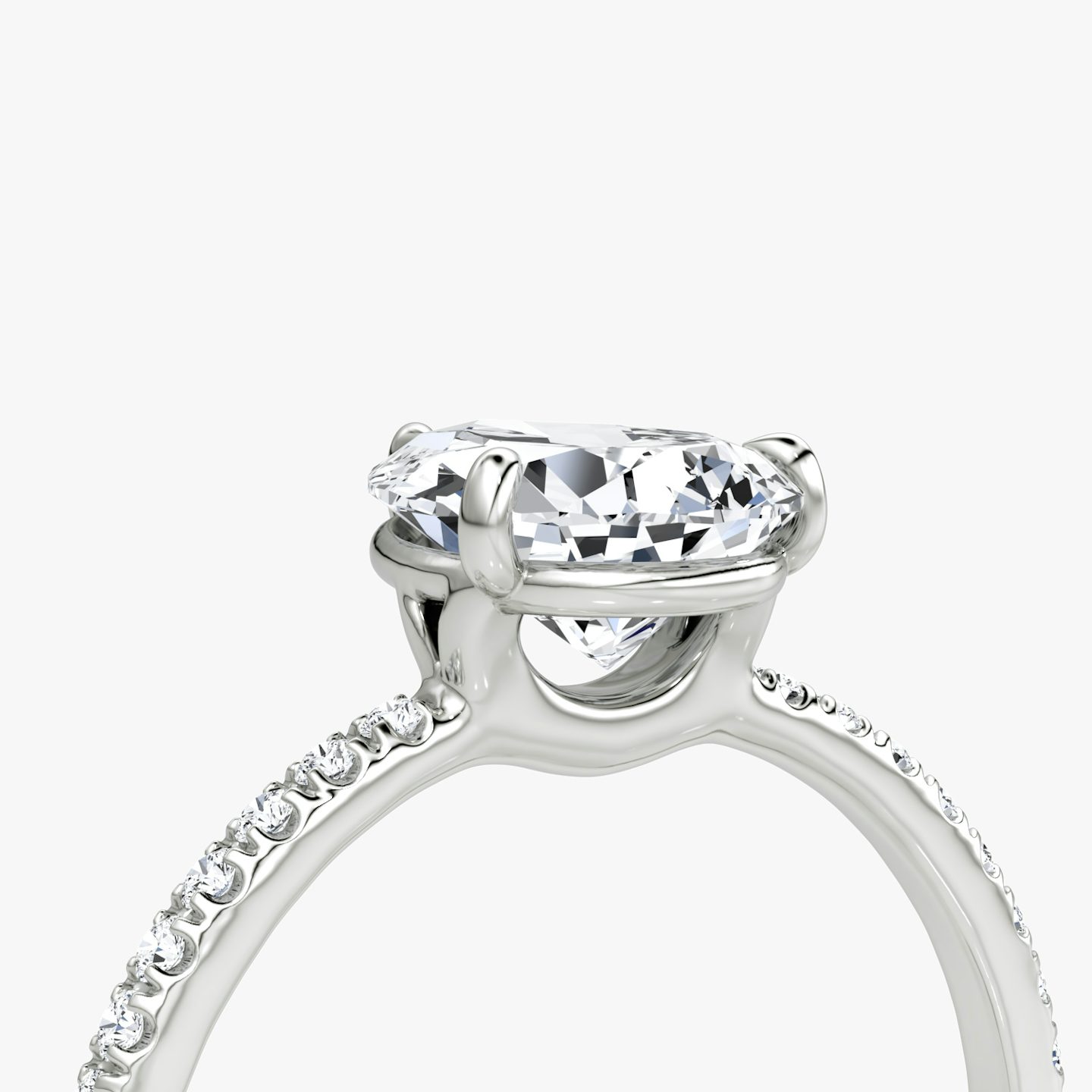 The Signature | Pear | Platinum | Band: Pavé | Band width: Standard | Setting style: Plain | Diamond orientation: vertical | Carat weight: See full inventory