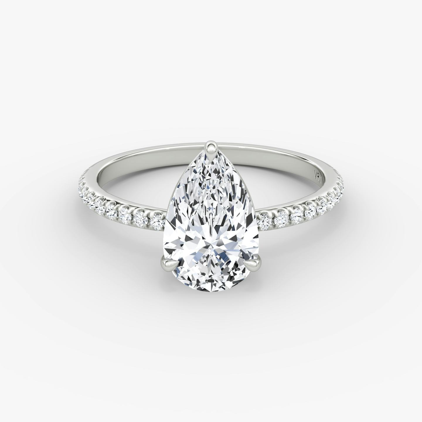 The Signature | Pear | Platinum | Band width: Standard | Band: Pavé | Setting style: Plain | Diamond orientation: vertical | Carat weight: See full inventory