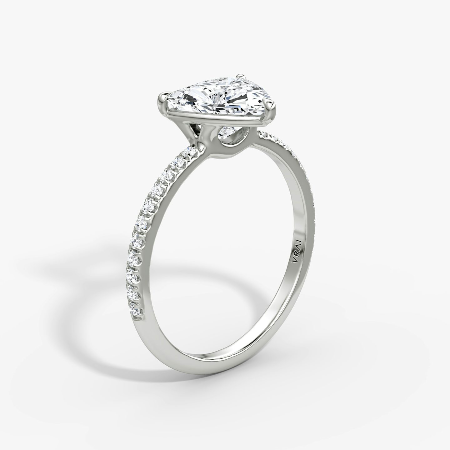 The Signature | Trillion | Platinum | Band: Pavé | Band width: Standard | Setting style: Plain | Diamond orientation: vertical | Carat weight: See full inventory