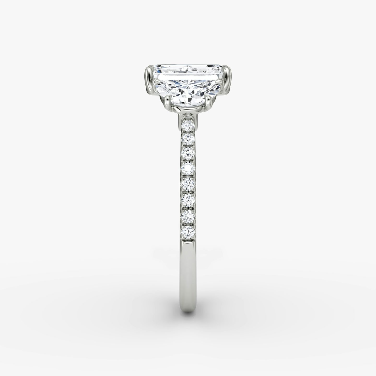 The Three Stone | Emerald | 18k | 18k White Gold | Band: Pavé | Side stone carat: 1/2 | Side stone shape: Half Moon | Diamond orientation: vertical | Carat weight: See full inventory