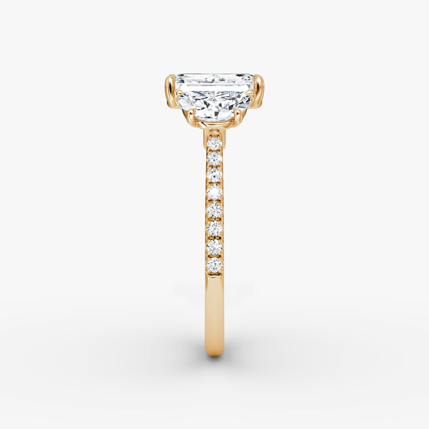 The Three Stone | Emerald | 14k | 14k Rose Gold | Band: Pavé | Side stone carat: 1/2 | Side stone shape: Half Moon | Diamond orientation: vertical | Carat weight: See full inventory