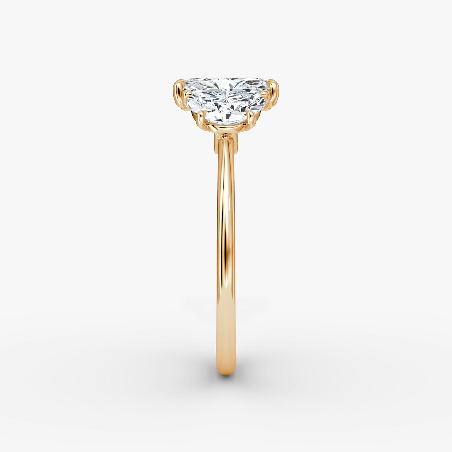 The Three Stone | Radiant | 14k | 14k Rose Gold | Band: Plain | Side stone carat: 1/2 | Side stone shape: Half Moon | Diamond orientation: vertical | Carat weight: See full inventory