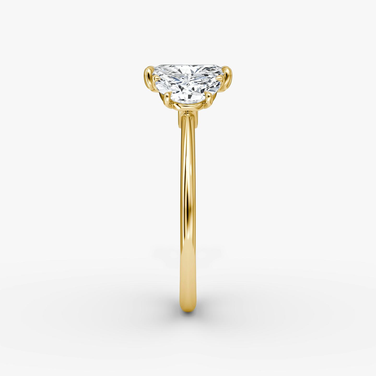 The Three Stone | Radiant | 18k | 18k Yellow Gold | Band: Plain | Side stone carat: 1/2 | Side stone shape: Half Moon | Diamond orientation: vertical | Carat weight: See full inventory