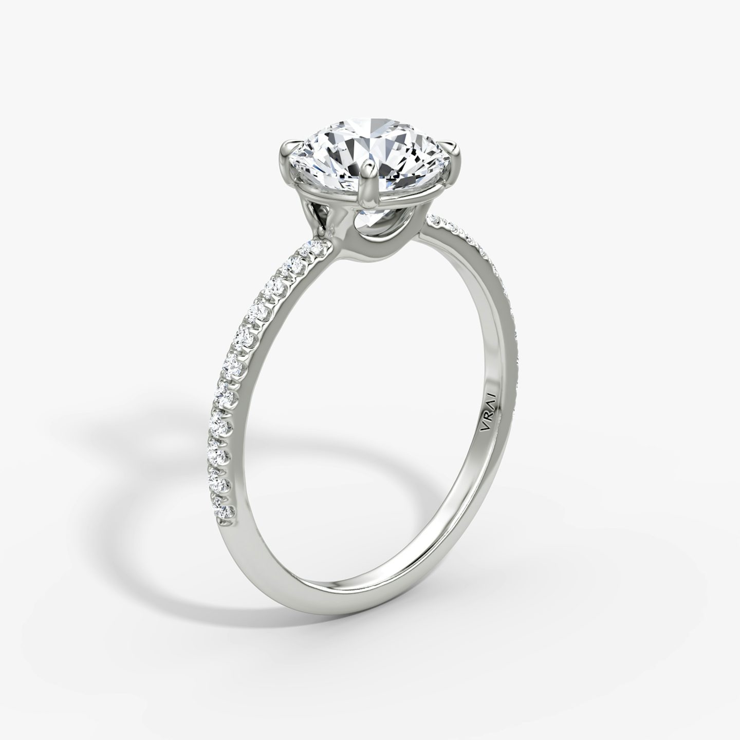 The Signature | Round Brilliant | 18k | 18k White Gold | Band width: Standard | Band: Pavé | Setting style: Plain | Carat weight: See full inventory | Diamond orientation: vertical