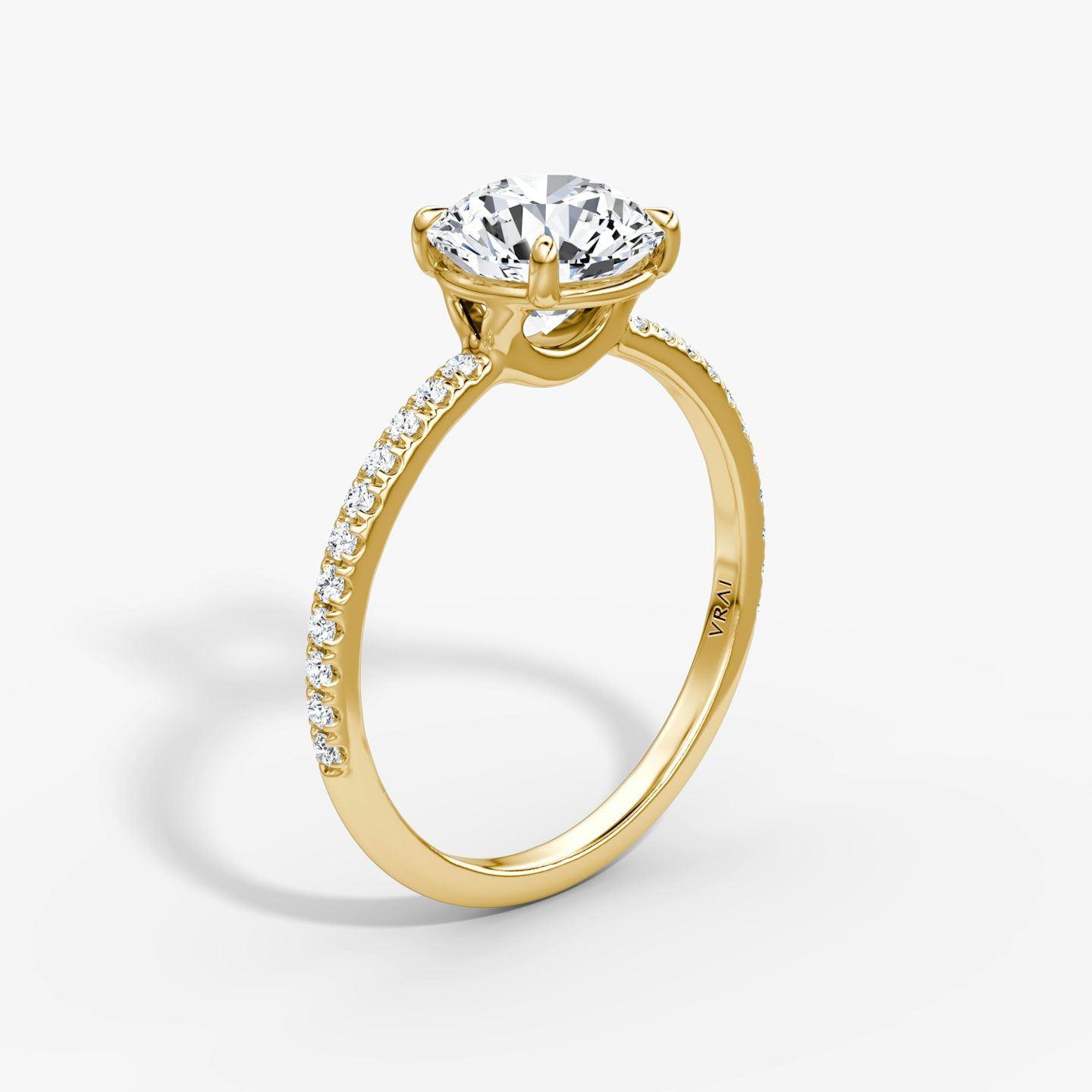 The Signature | Round Brilliant | 18k | 18k Yellow Gold | Band: Pavé | Band width: Standard | Carat weight: See full inventory | Setting style: Plain | Diamond orientation: Horizontal