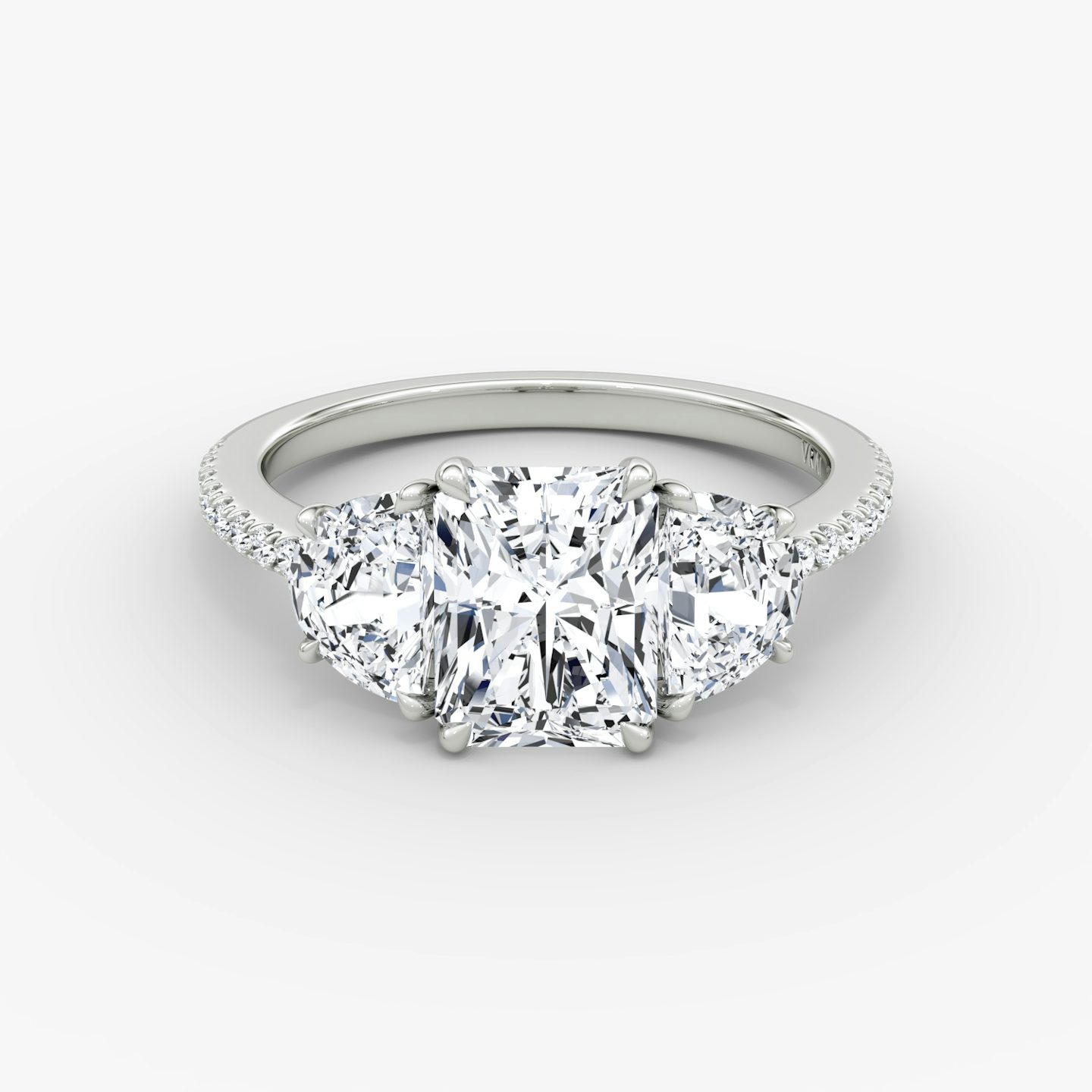 undefined | Radiant | Platinum | Band: Pavé | Side stone carat: 1/2 | Side stone shape: Half Moon | Diamond orientation: vertical | Carat weight: See full inventory