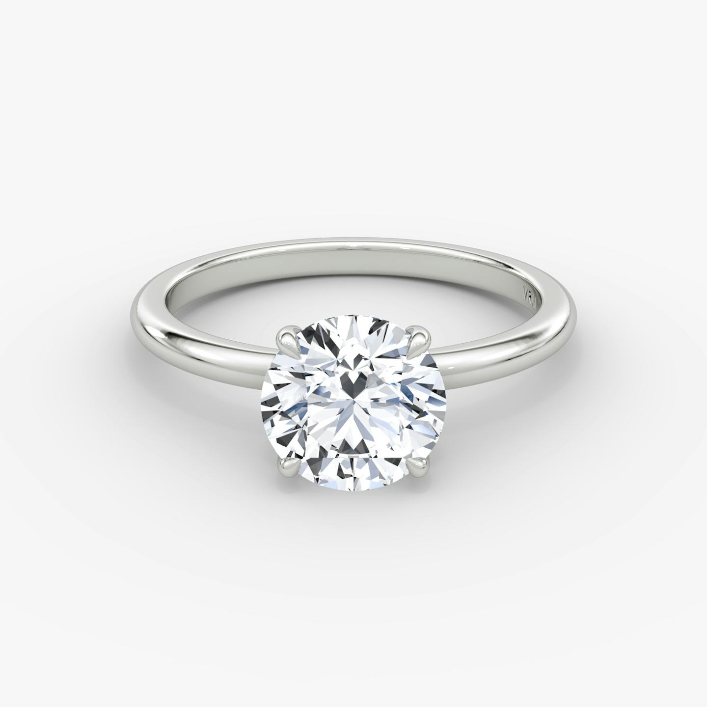 The Signature | Round Brilliant | 18k | 18k White Gold | Band width: Standard | Band: Plain | Setting style: Plain | Carat weight: See full inventory | Diamond orientation: vertical