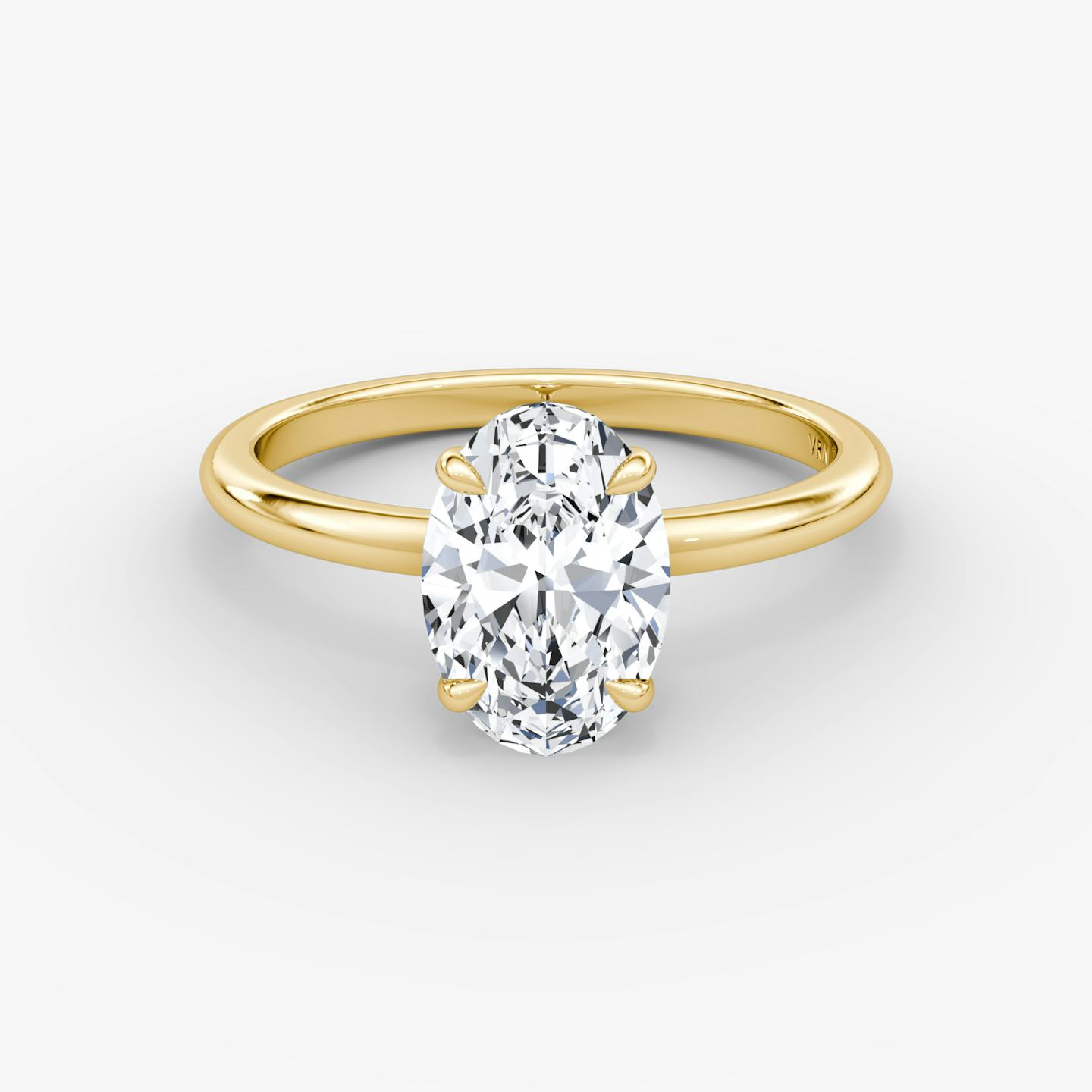 The Signature | Oval | 18k | 18k Yellow Gold | Band width: Standard | Band: Plain | Setting style: Plain | Diamond orientation: vertical | Carat weight: See full inventory