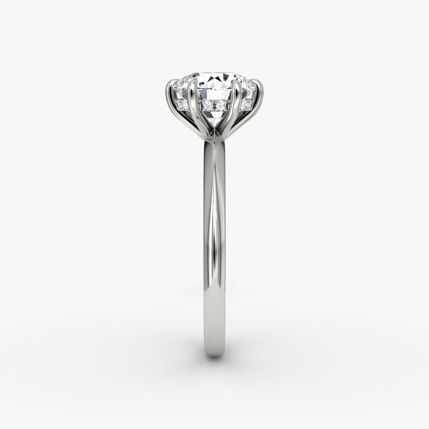 The Knife-Edge | Round Brilliant | Platinum | Band: Plain | Setting style: Hidden Halo | Carat weight: See full inventory | Diamond orientation: vertical