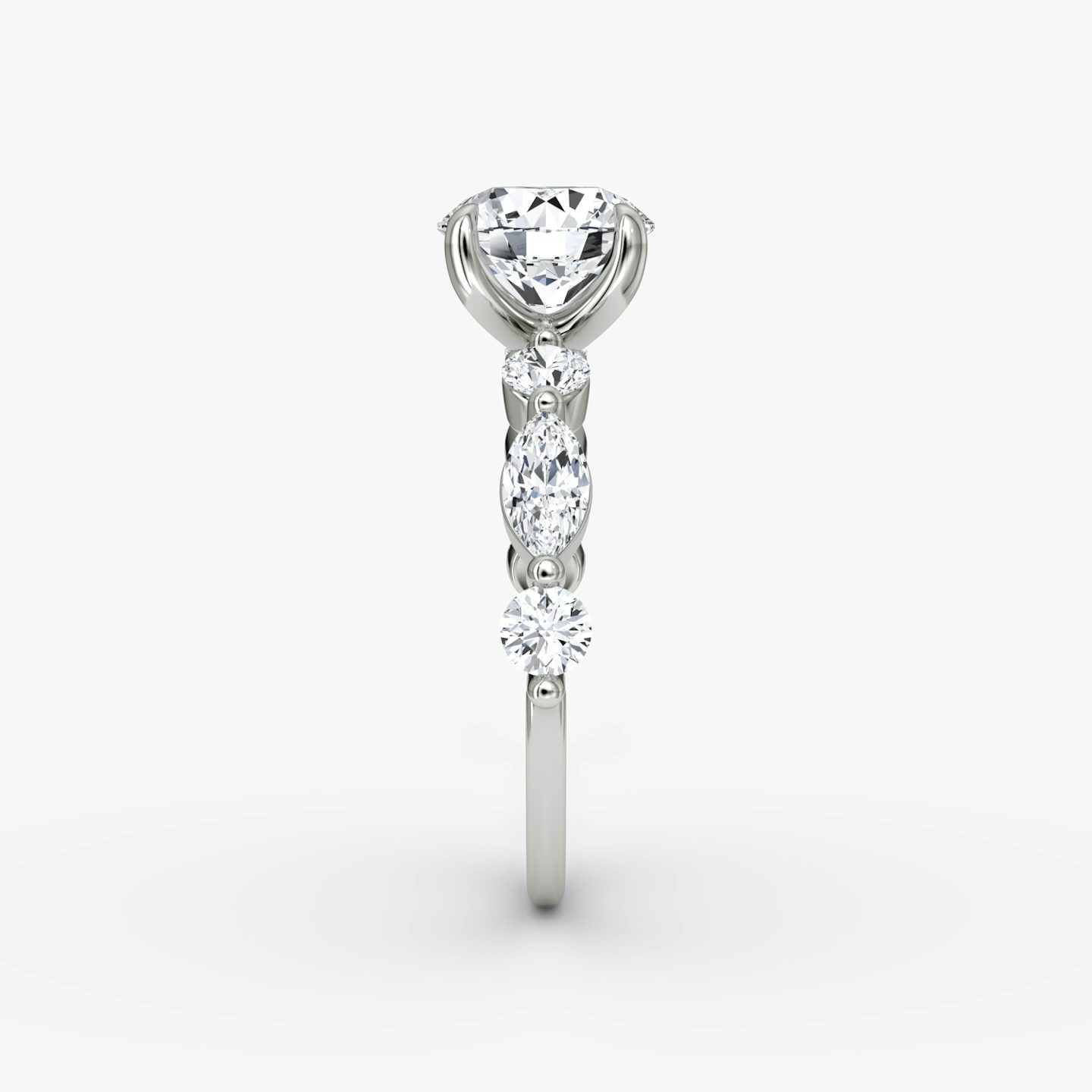 The Mixed Shape Single Shared Prong | Round Brilliant | 18k | 18k White Gold | Band: Plain | Carat weight: See full inventory | Diamond orientation: vertical