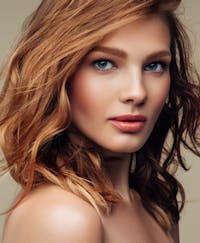 Woman with red hair and blue eyes