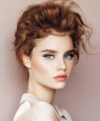 Beautiful woman with red wavy hair