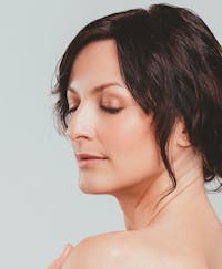 Woman with her eyes closed
