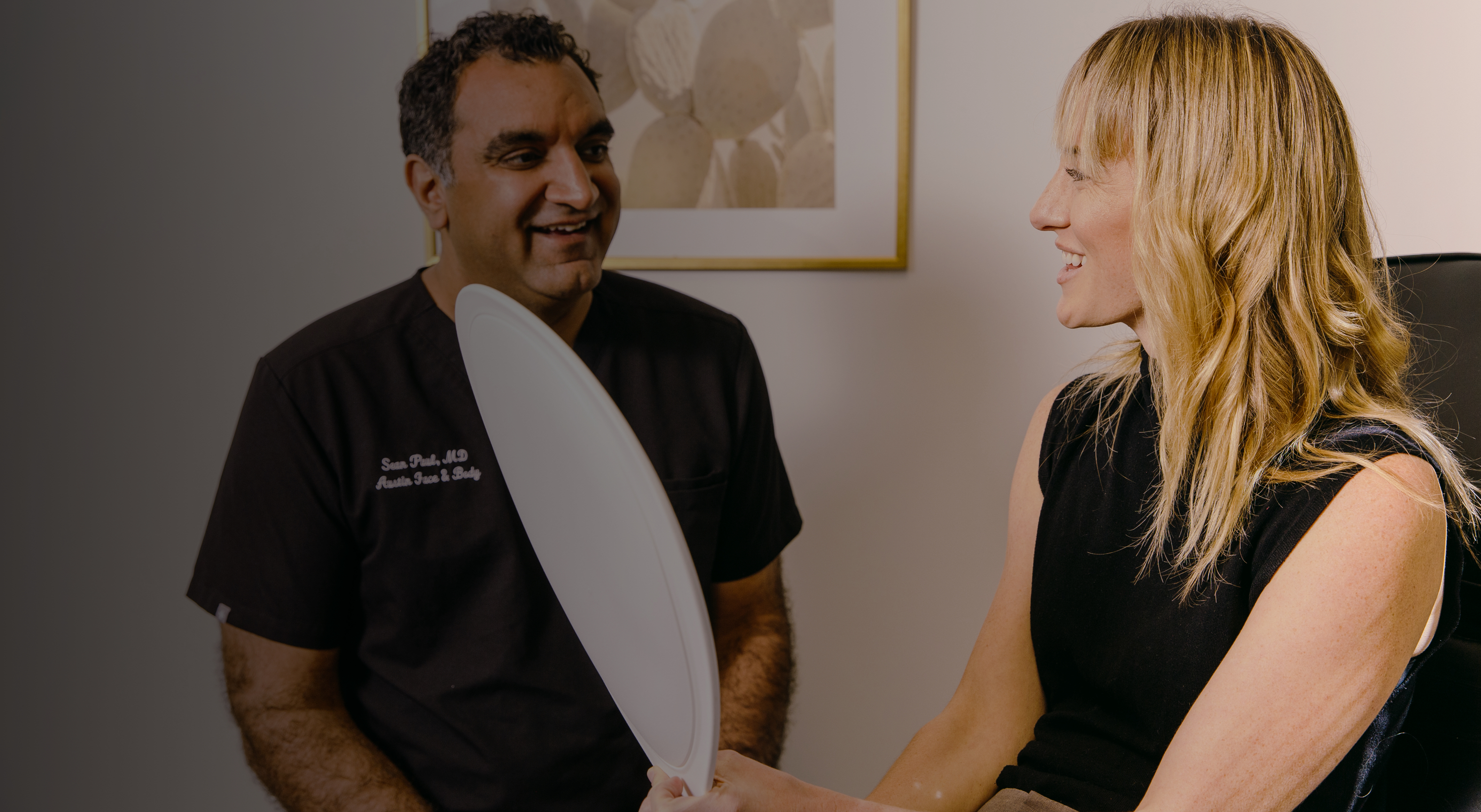 Dr. Paul talking to a patient