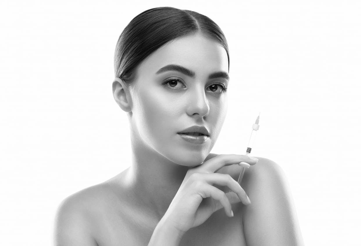 woman with a syringe in her hand