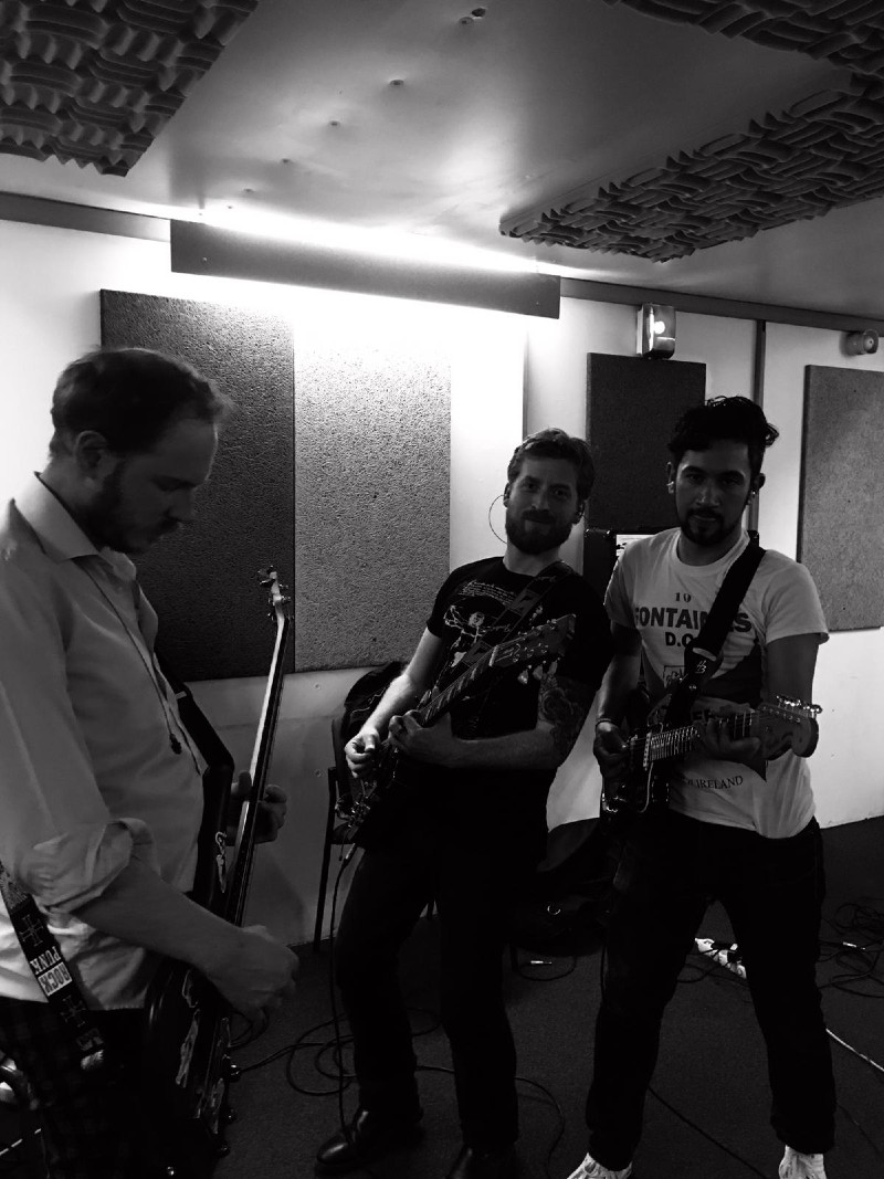 Singer, guitarist and bassist of Cat Rodeo rock band at Luna Rossa studio