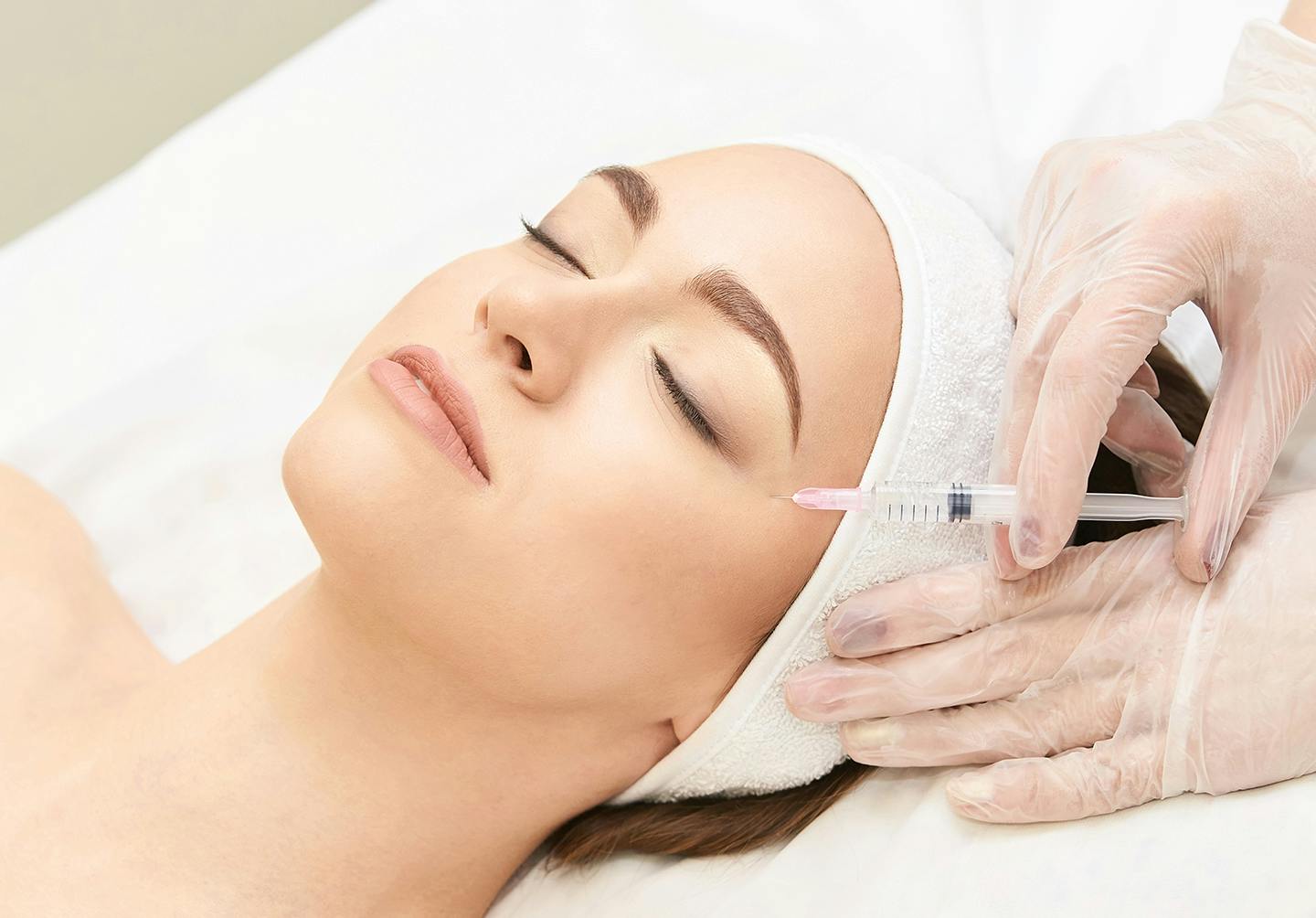 Woman getting injected