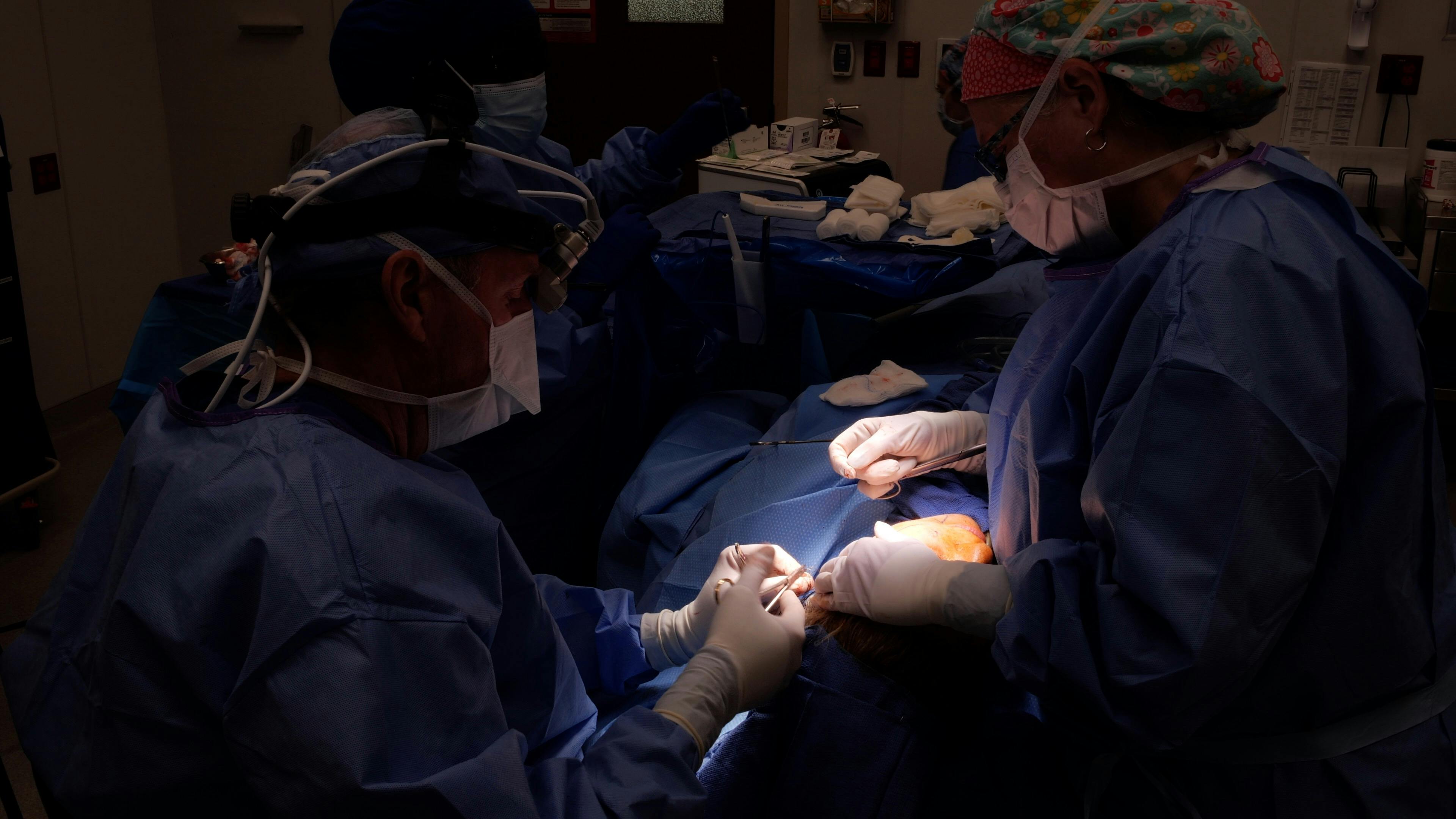 Picture of surgeons performing a facelift