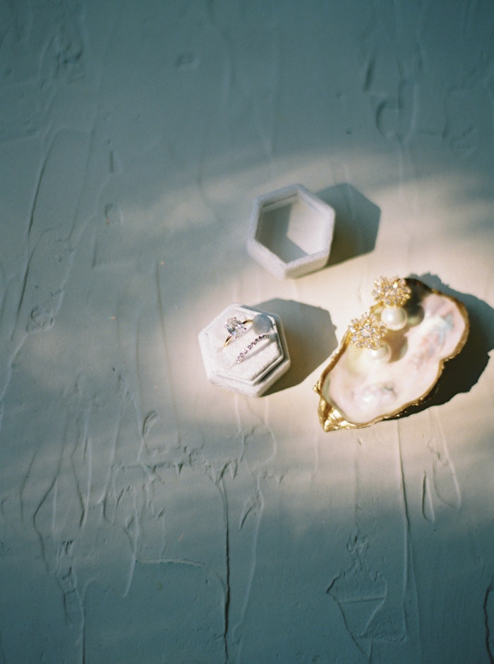 Bridal details photographed in a moody way with dappled sunlight in Toronto Ontario.