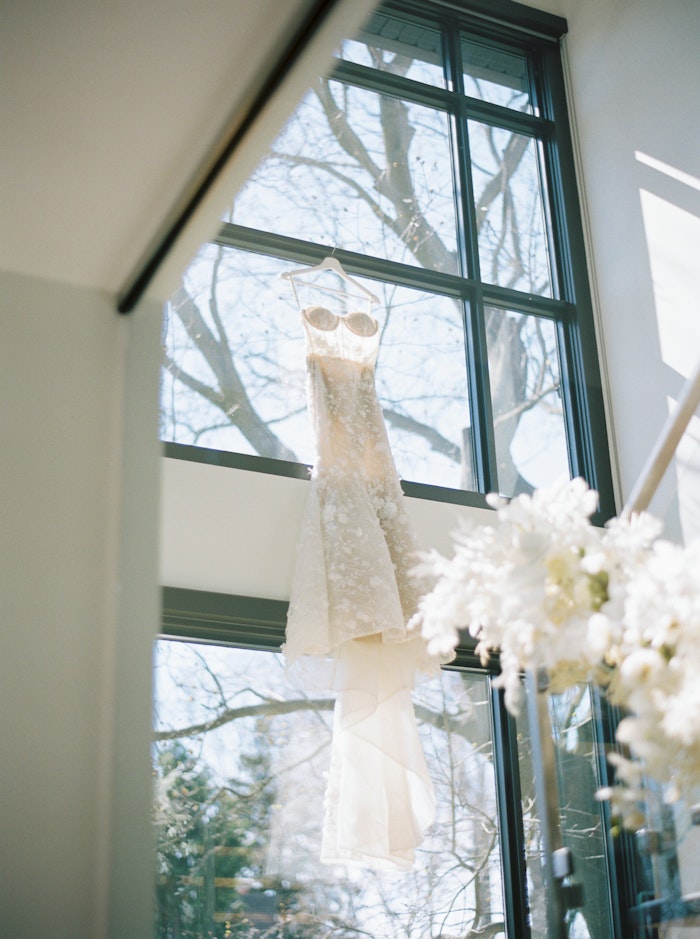 A beautiful wedding dress photographed in Toronto Ontario by Whitney Heard.