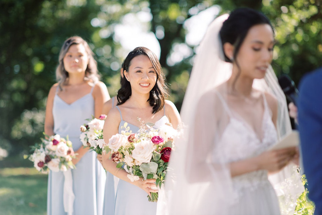 Wedding guests smiling and emotional during outdoor ceremony at Spadina House Museum Toronto