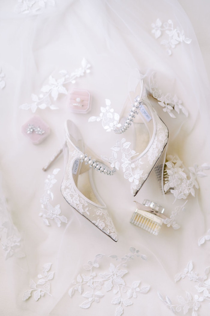 Elegant bridal details with lace gown and veil close-up