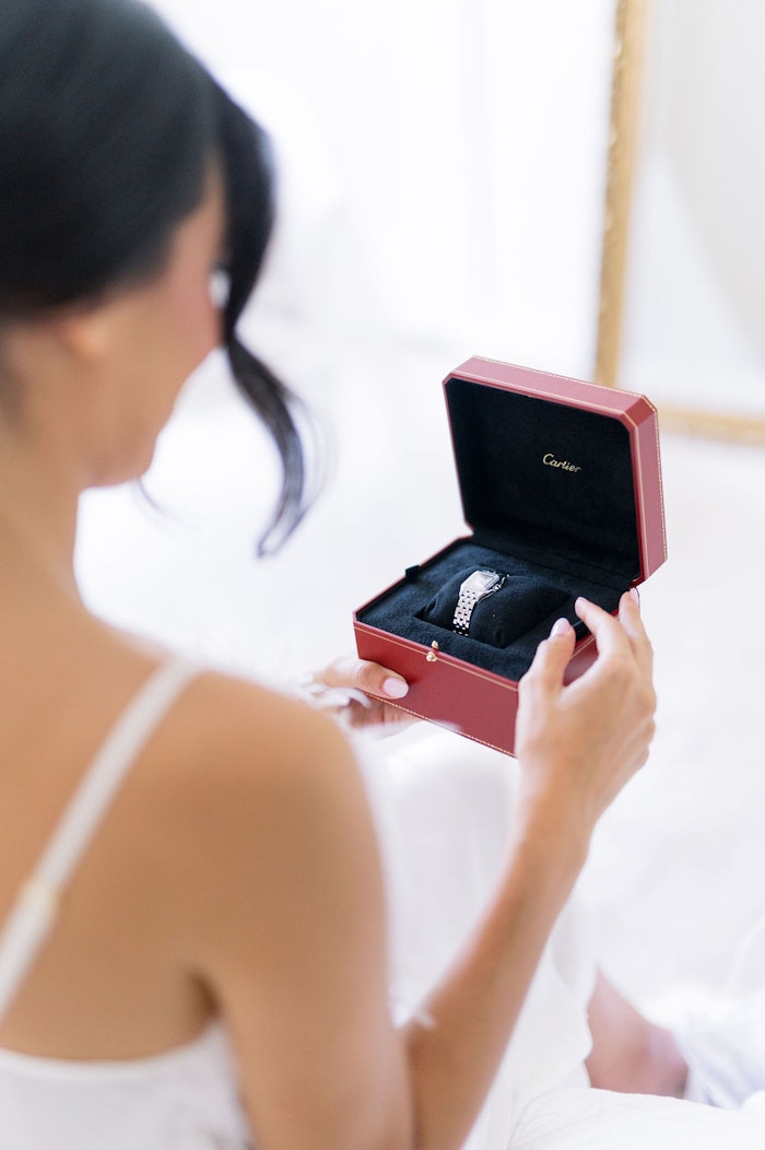 High fashion wedding portrait of bride in lace gown