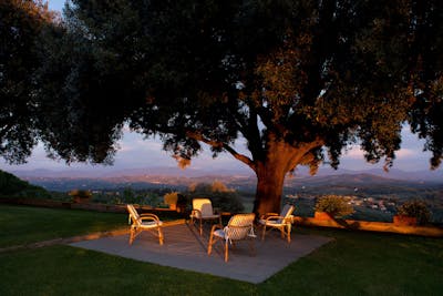 The private garden of Villa La Tavernaccia has a unique vista on the rolling hills of Chianti.