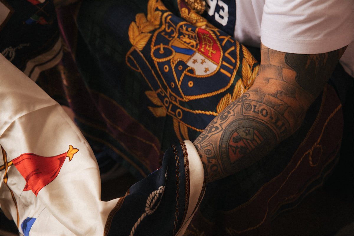 Close up of a tattooed arm and fabric.