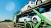 Truck transporting cars