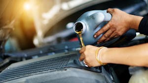 Close up image of pouring a gasoline