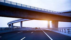 City road and bridge during sunset