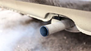 Close up image of a car exhaust pipe