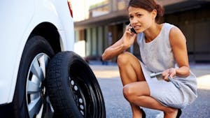 Businesswoman flat tire