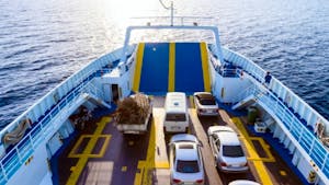 Ferryboat full with vehicles on deck