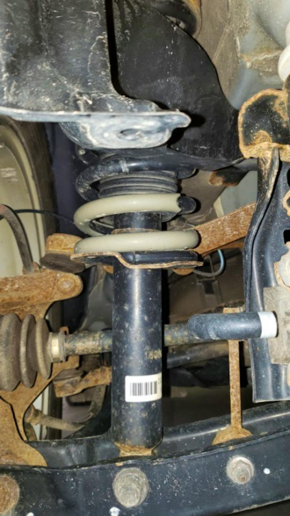 What are the symptoms of a bad or damaged shock absorber?
