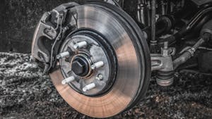 Automobile braking system and brake disk with support